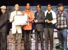 Mr Pradhan getting Fakirmohan Sahitya Parishad Award